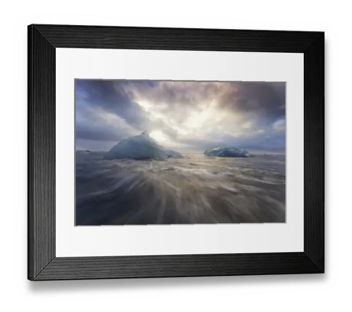 Framed Print : Europe, Iceland, Jokulsarlon Glacier Lagoon. Waves wash beached icebergs. Credit as