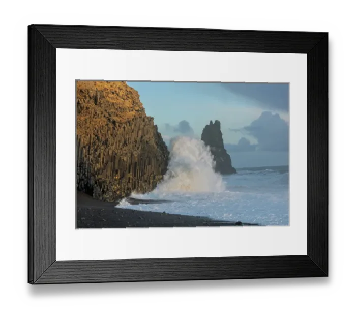 Framed Print : Waves from the North Atlantic Ocean crash into basalt columns at the Black Beach near Vik
