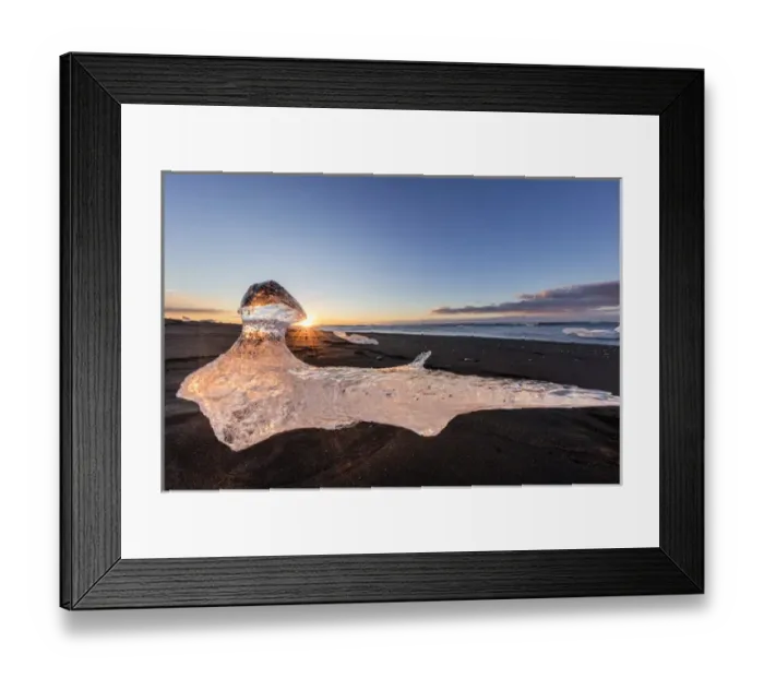 Framed Print : Scattered ice from icebergs on black sand beach at Joklusarlon, Iceland