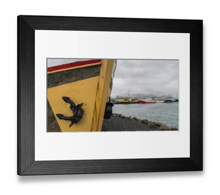 Framed Print : The harbour of the small town Hoefn during winter. Old ship used as a museum in the harbour