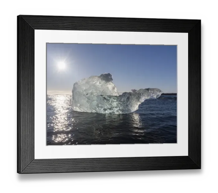 Framed Print : icebergs on black volcanic beach. Beach of the north atlantic near the glacial lagoon Joekulsarlon