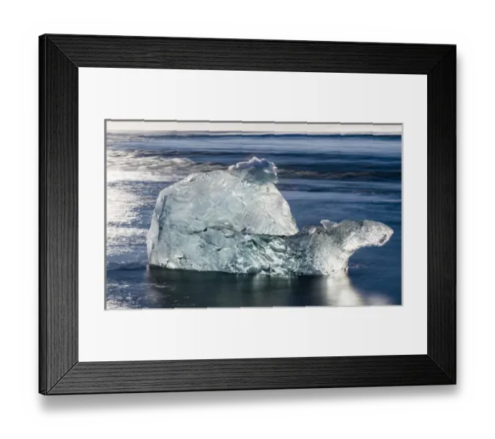 Framed Print : icebergs on black volcanic beach. Beach of the north atlantic near the glacial lagoon Joekulsarlon