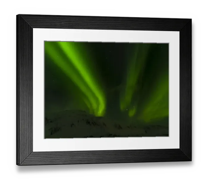 Framed Print : Northern Lights or aurora borealis near Hoefn, over the mountains of Vatnajoekull NP during Winter