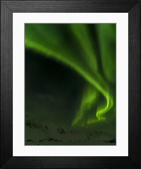 Framed Print : Northern Lights or aurora borealis near Hoefn, over the mountains of Vatnajoekull NP during Winter