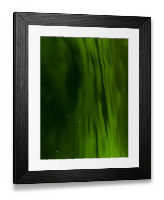 Framed Print : Northern Lights or aurora borealis near Hoefn, over the mountains of Vatnajoekull NP during Winter