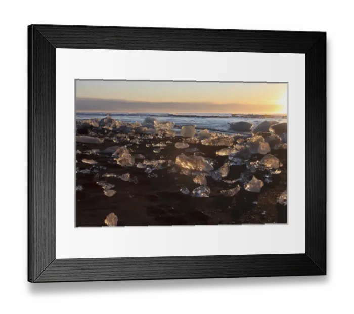 Framed Print : Iceberg nuggets shine like diamants at sunrise. Beach at Jokulsarlon, Iceland