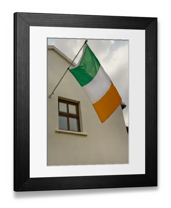 Framed Print : Ireland, County Mayo, Achill Island, Dooagh. The flag of Ireland flies from building