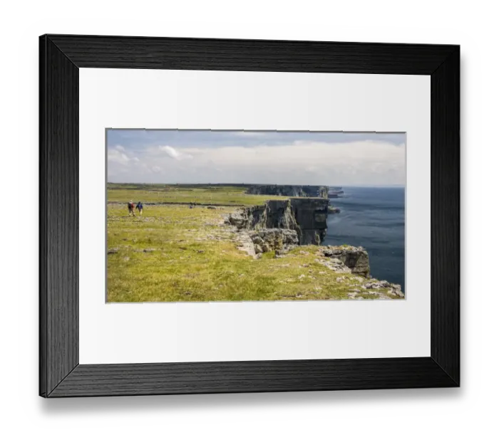 Framed Print : Inishmore Island. Aran Islands. Ireland. Limestone Sea Cliffs. Atlantic Coast. Hikers