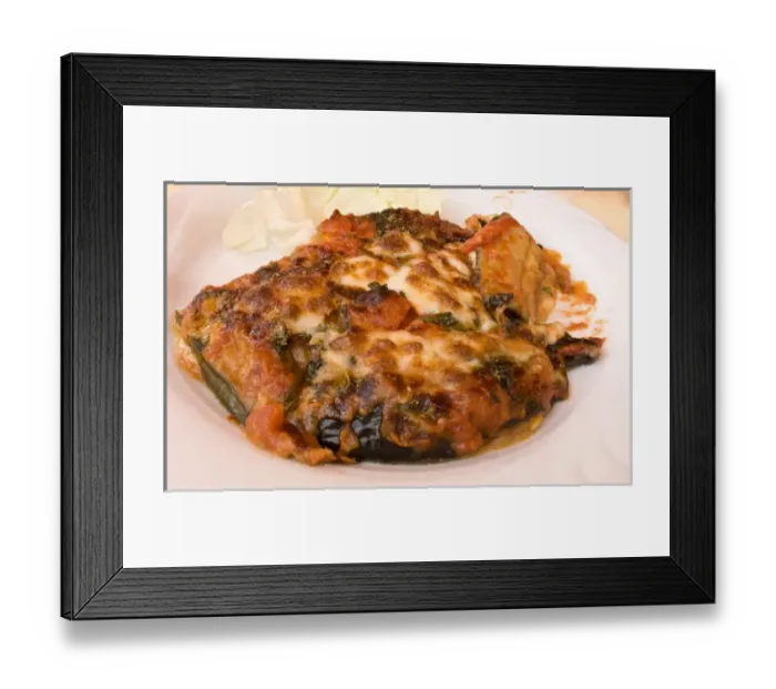 Framed Print : Europe, Italy, Positano. Display plate of eggplant parmesean