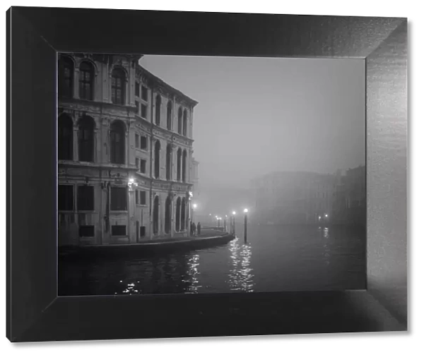 Europe, Italy, Venice. Building with Grand Canal on foggy morning