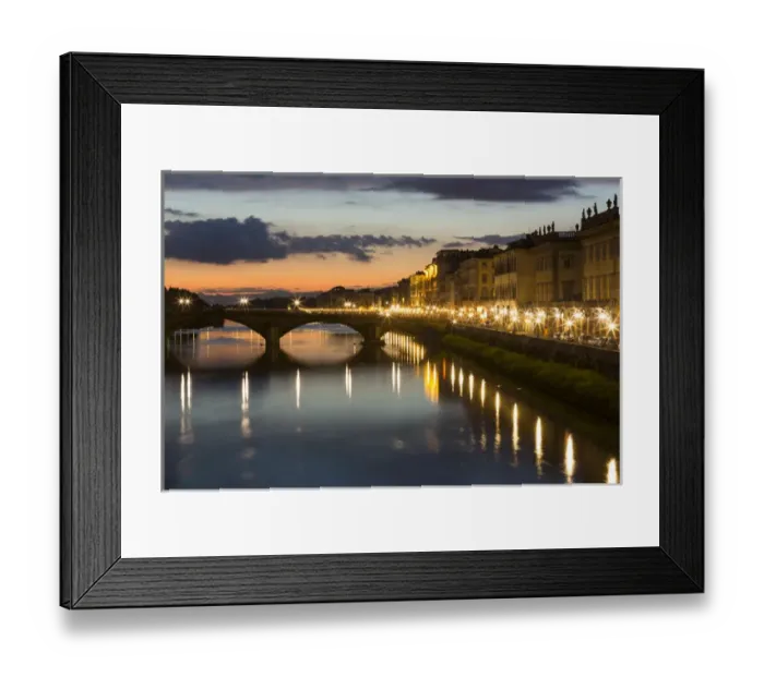 Framed Print : Europe, Italy, Florence. As dusk falls, city streetlights illuminate the riverfront streets Framed Print : Europe, Italy, Florence. As dusk falls, city streetlights illuminate the riverfront streets