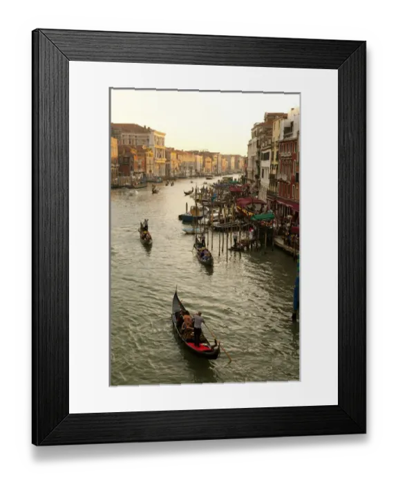 Framed Print : Italy; Venice. The bustling riverfront along the Grand Canal in Venice at sunrise Framed Print : Italy; Venice. The bustling riverfront along the Grand Canal in Venice at sunrise