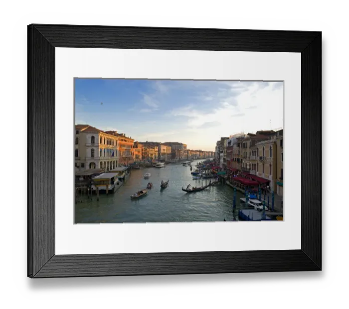 Framed Print : Italy; Venice. The bustling riverfront along the Grand Canal in Venice at sunrise Framed Print : Italy; Venice. The bustling riverfront along the Grand Canal in Venice at sunrise