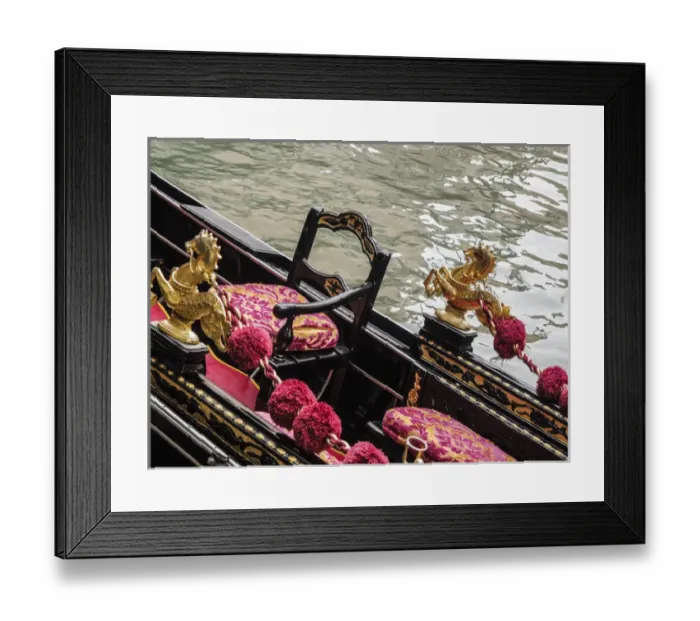 Framed Print : Venice, Italy. Gondola interior adorned with a golden horse serpent, velveteen cushions