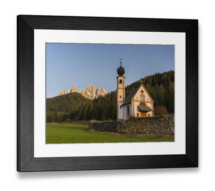 Framed Print : The peaks of the Geisler mountain range in valley Villnoess. The church Sankt Johann in Ranui (St Framed Print : The peaks of the Geisler mountain range in valley Villnoess. The church Sankt Johann in Ranui (St
