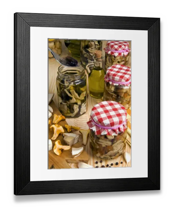 Framed Print : Mushrooms in jar preserved in olive oil Framed Print : Mushrooms in jar preserved in olive oil