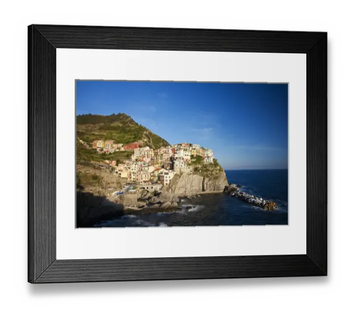 Framed Print : Europe; Italy; Cinque Terre; Manarola; Evening Light on the City Framed Print : Europe; Italy; Cinque Terre; Manarola; Evening Light on the City