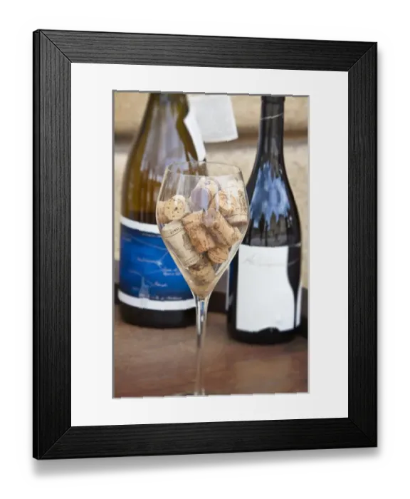 Framed Print : Europe; Italy; Monteriggoni; Chianti Wine and a Glass Full of Corks Framed Print : Europe; Italy; Monteriggoni; Chianti Wine and a Glass Full of Corks