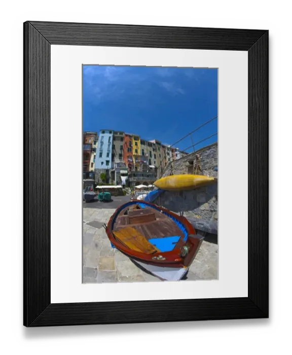 Framed Print : Europe; Italy; La Spezia; Portovenere; Small Fishing Boat with City in Background