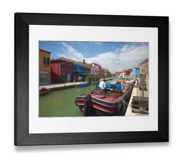 Framed Print : Europe; Italy; Burano; Bright Colored Homes Along the Canal, Man Delivery Supplies