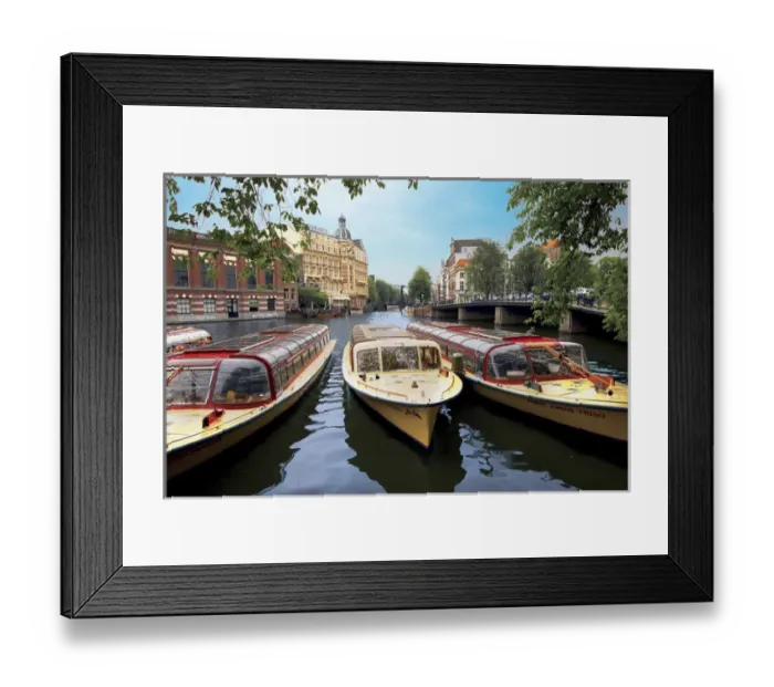 Framed Print : Refurbished old canal cruise boats moored along Amstel canal in Amsterdam, The Netherlands