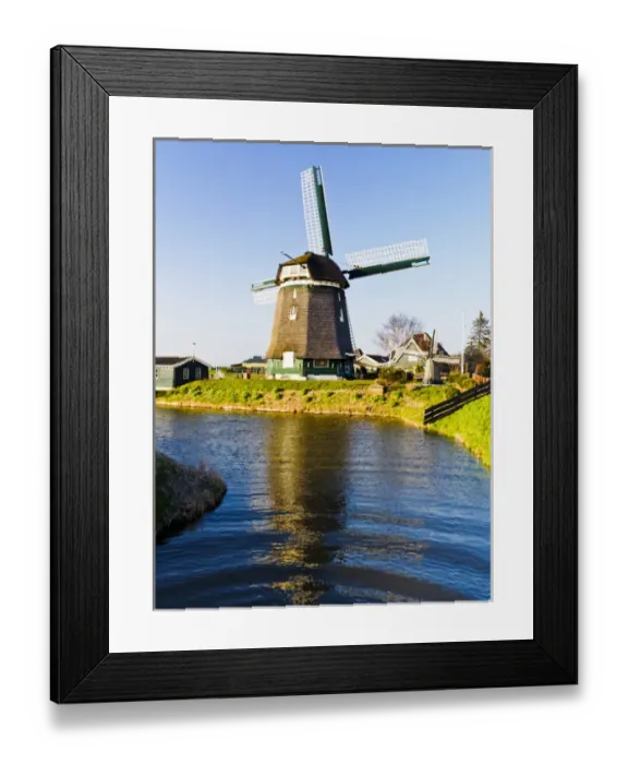 Framed Print : Europe; Netherlands; Nord Holland; Windmill along canal of Nord Holland