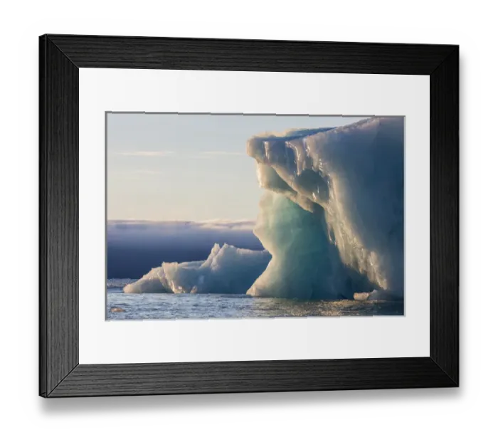 Framed Print : Norway, Svalbard, Kvitoya. Iceberg and fog bank at sunrise