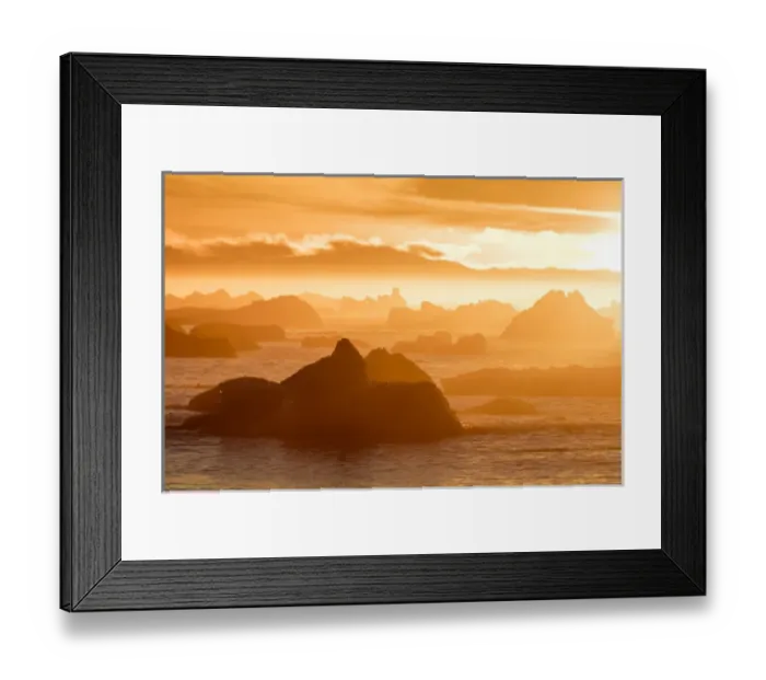 Framed Print : Norway, Svalbard, Nordaustlandet. Silhouette of icebergs backlit at sunset. Credit as Framed Print : Norway, Svalbard, Nordaustlandet. Silhouette of icebergs backlit at sunset. Credit as
