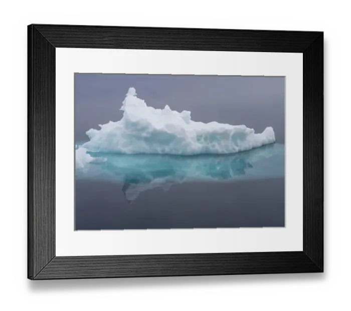 Framed Print : Arctic Ocean, Norway, Svalbard. Iceberg reflects in ocean