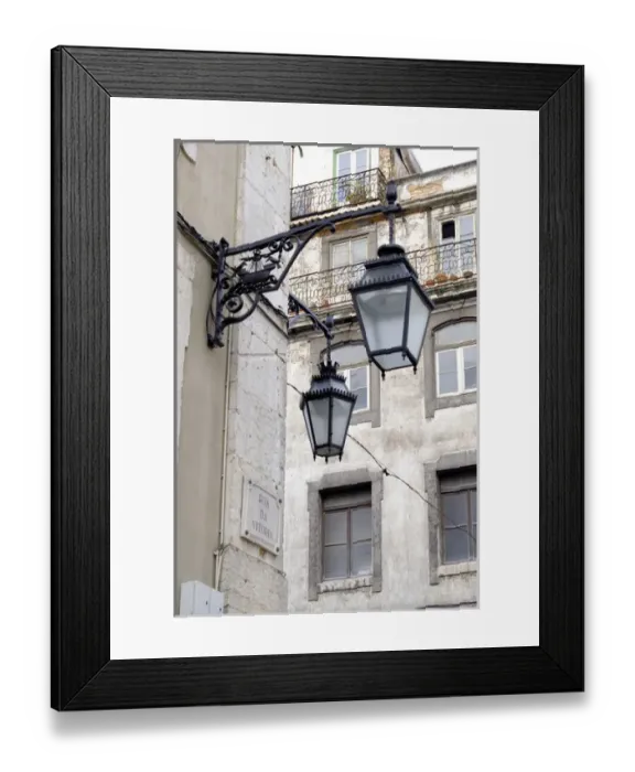 Framed Print : Portugal, Lisbon. Wrought iron street lights on corner of building Framed Print : Portugal, Lisbon. Wrought iron street lights on corner of building