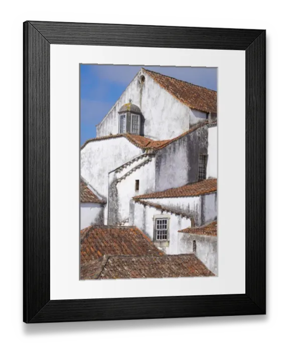 Framed Print : Portugal, Obidos. Ancient, red, terra cotta tiled roof tops, lines. Old windows