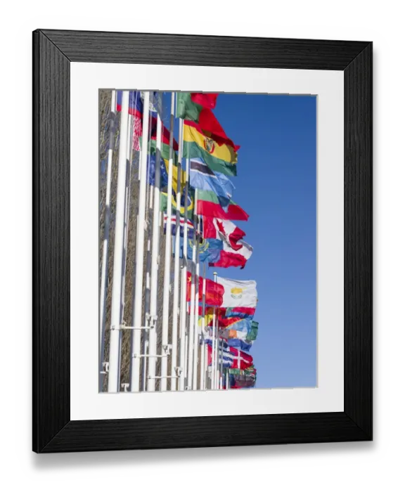 Framed Print : Parque das Nacoes, Flags in the area of the 1998 worlds fair area at the banks of river Tagus Framed Print : Parque das Nacoes, Flags in the area of the 1998 worlds fair area at the banks of river Tagus