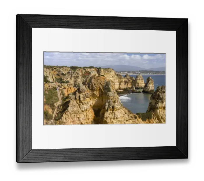 Framed Print : The cliffs and sea stacks of Ponta da Piedade at the rocky coast of the Algarve in Portugal