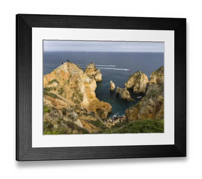 Framed Print : The cliffs and sea stacks of Ponta da Piedade at the rocky coast of the Algarve in Portugal Framed Print : The cliffs and sea stacks of Ponta da Piedade at the rocky coast of the Algarve in Portugal