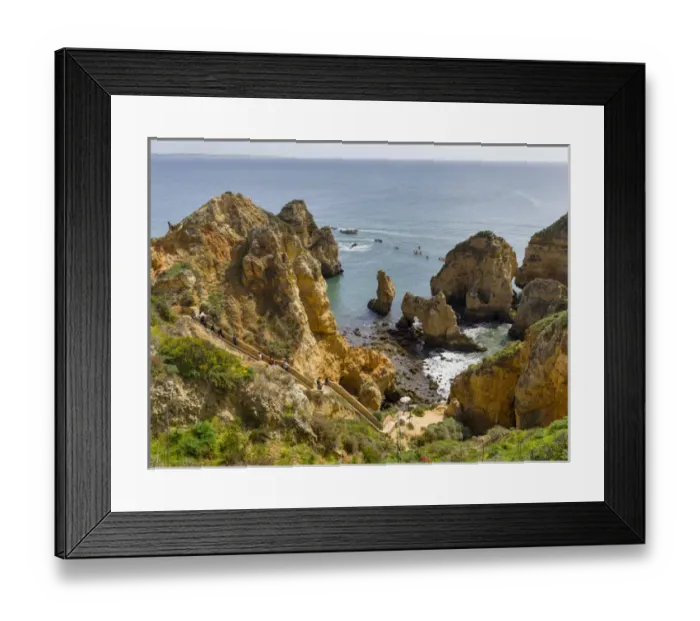 Framed Print : The cliffs and sea stacks of Ponta da Piedade at the rocky coast of the Algarve in Portugal