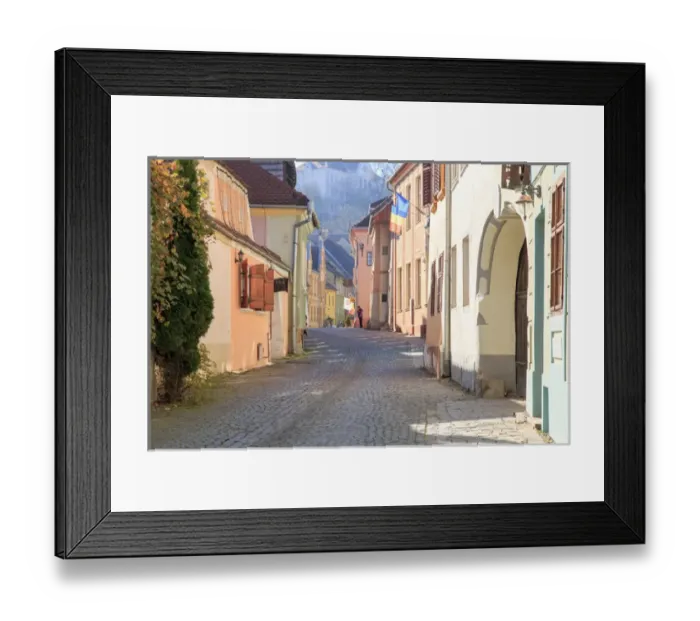 Framed Print : Europe, Transylvania, Romania, Mures County, Sighisoara, cobblestone residential street in village Framed Print : Europe, Transylvania, Romania, Mures County, Sighisoara, cobblestone residential street in village