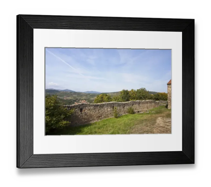 Framed Print : the romanic church of Cisnadioara with walls to defend the church and the citizens Framed Print : the romanic church of Cisnadioara with walls to defend the church and the citizens