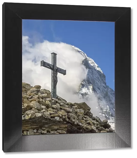 Switzerland, Zermatt, Matterhorn with clouds and cross