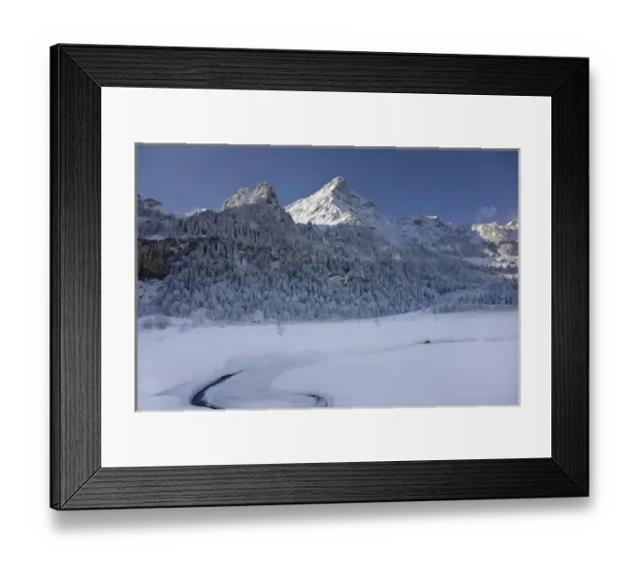 Framed Print : Winter landscape at Tschingelsee (lake Tschingel) in Kiental, Bernese Alps, with mornig fog