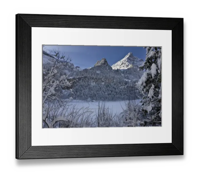 Framed Print : Winter landscape at Tschingelsee (lake Tschingel) in Kiental, Bernese Alps, with mornig fog