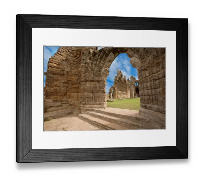 Framed Print : The Ruins of Whitby Abbey above the town and harbor of Whitby on the North Yorkshire Framed Print : The Ruins of Whitby Abbey above the town and harbor of Whitby on the North Yorkshire