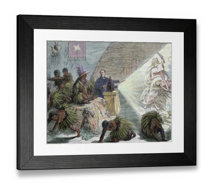 Framed Print : Africa. European settler instructing the natives by a projection with the unit called