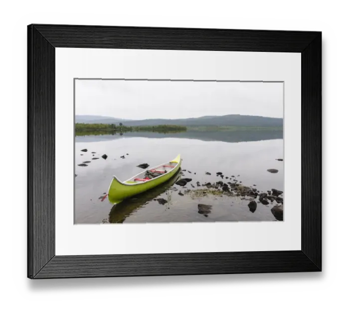 Framed Print : Sweden, Norrbotten, Torne River. Canoe in tranquil waters Framed Print : Sweden, Norrbotten, Torne River. Canoe in tranquil waters