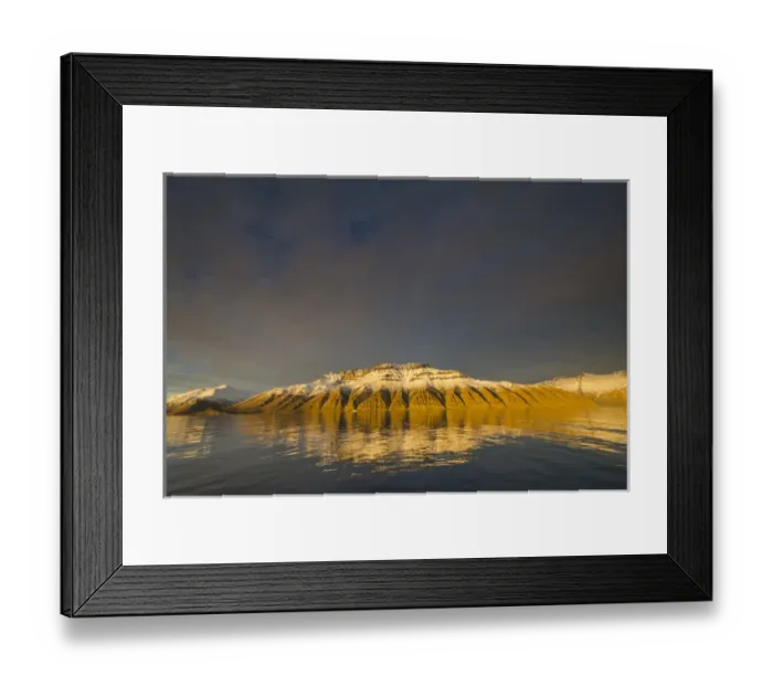 Framed Print : Greenland. Kong Oscar Fjord. Deeply eroded mountains reflected in the calm water Framed Print : Greenland. Kong Oscar Fjord. Deeply eroded mountains reflected in the calm water