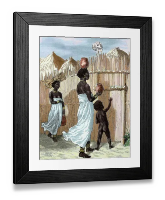 Framed Print : Africa. Two women and a child entering in the village