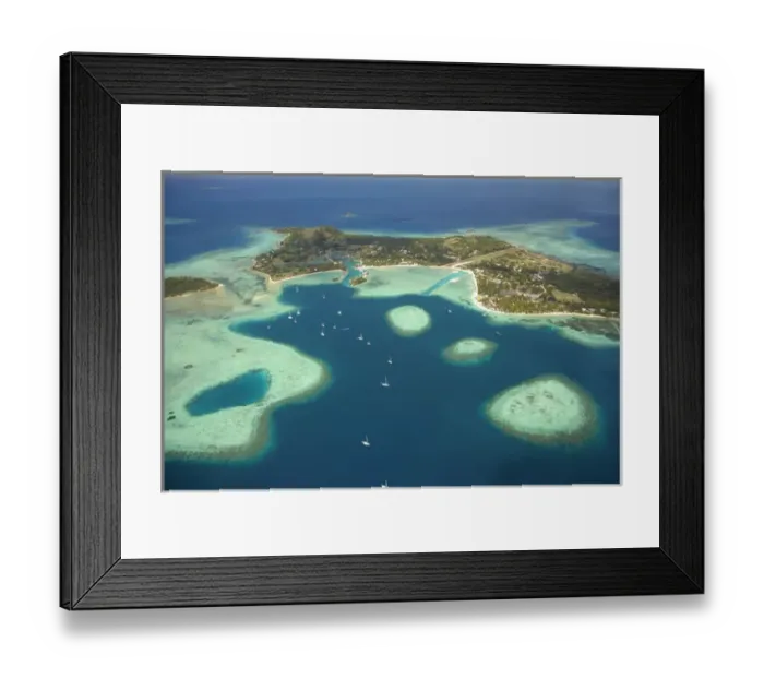 Framed Print : Coral reef and Musket Cove Island Resort (left), Plantation Island Resort (right)