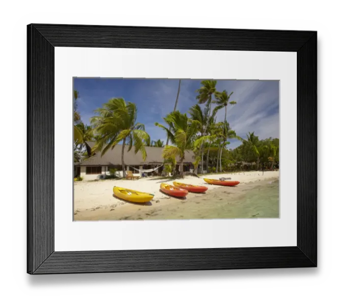 Framed Print : Kayak on the beach, and waterfront bure, Plantation Island Resort, Malolo Lailai Island