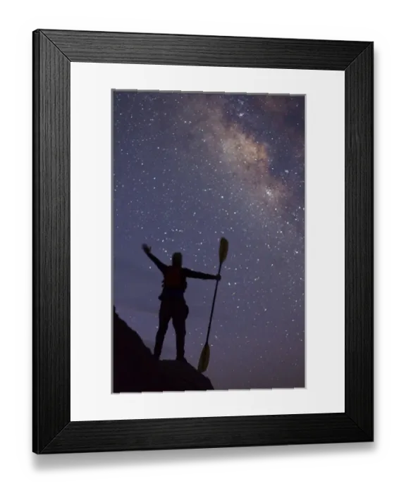 Framed Print : Isla Carmen, Sea of Cortez, Baja, Mexico. A kayaker in silhouette lifts his arms Framed Print : Isla Carmen, Sea of Cortez, Baja, Mexico. A kayaker in silhouette lifts his arms