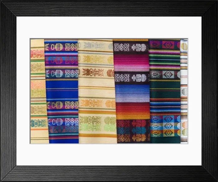Framed Print : South America, Ecuador, Quito. Colorful shawls displayed at market