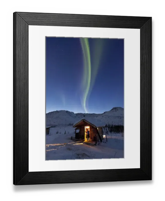 Framed Print : A person stands in the doorway of the Caribou Bluff cabin and watches in awe as Framed Print : A person stands in the doorway of the Caribou Bluff cabin and watches in awe as